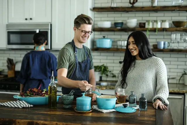 Food business team cooking together in a bright shared kitchen